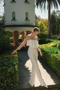 mono blanco de novia con cuerpo plumetti