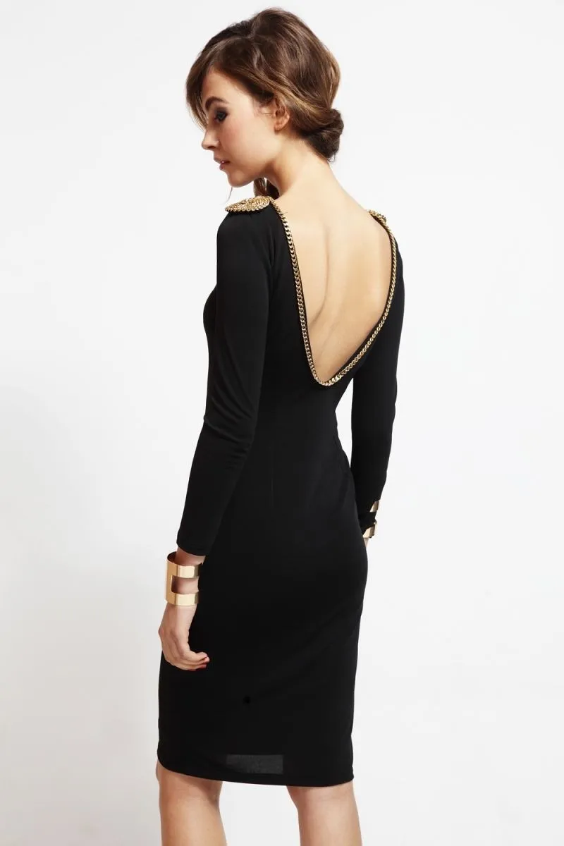 vestido corto de fiesta negro con escote en espalda con cadena