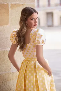 Conjunto top y falda abullonado de lunares amarillo