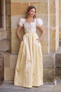 Conjunto top y falda abullonado de lunares amarillo