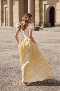 Conjunto top y falda abullonado de lunares amarillo