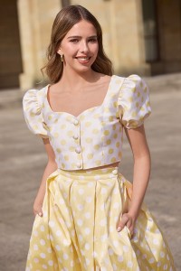 Conjunto top y falda abullonado de lunares amarillo