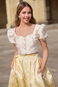 Conjunto top y falda abullonado de lunares amarillo