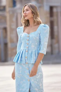 vestido de fiesta brocado azul con peplum y boton joya