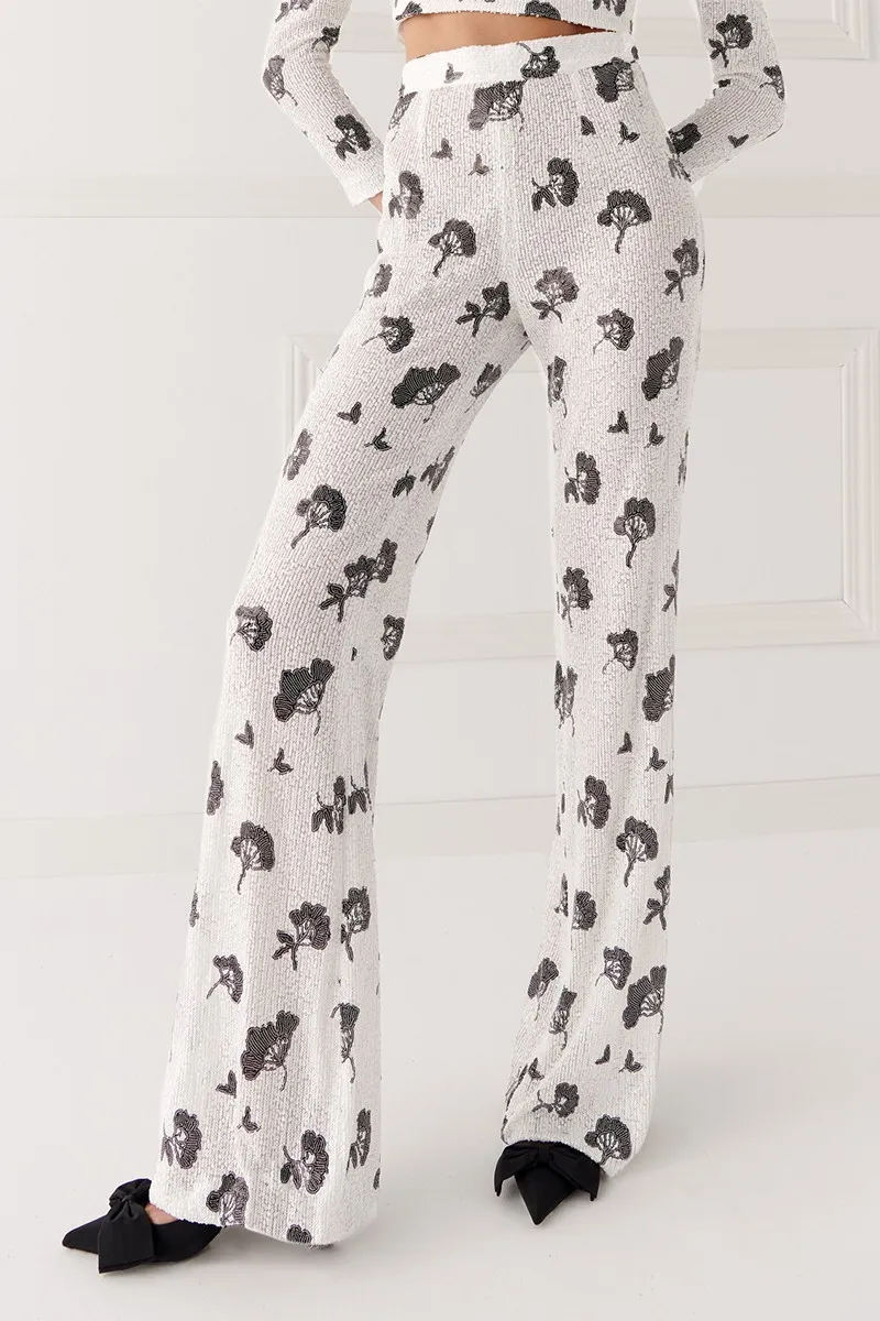 Pantalón palazzo lentejuelas blancas y negras