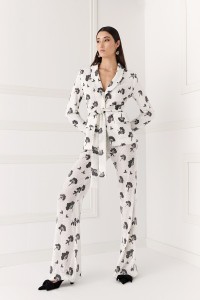 Chaqueta de lentejuelas blanca y negra para invitada