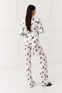 Chaqueta de lentejuelas blanca y negra para invitada