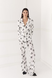 Chaqueta de lentejuelas blanca y negra para invitada