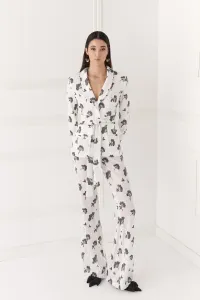 Chaqueta de lentejuelas blanca y negra para invitada