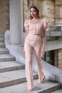 Top en tweed rosa con lentejuelas doradas con manga abullonada