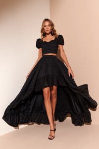 Conjunto de top y falda troquelado negro Giselle