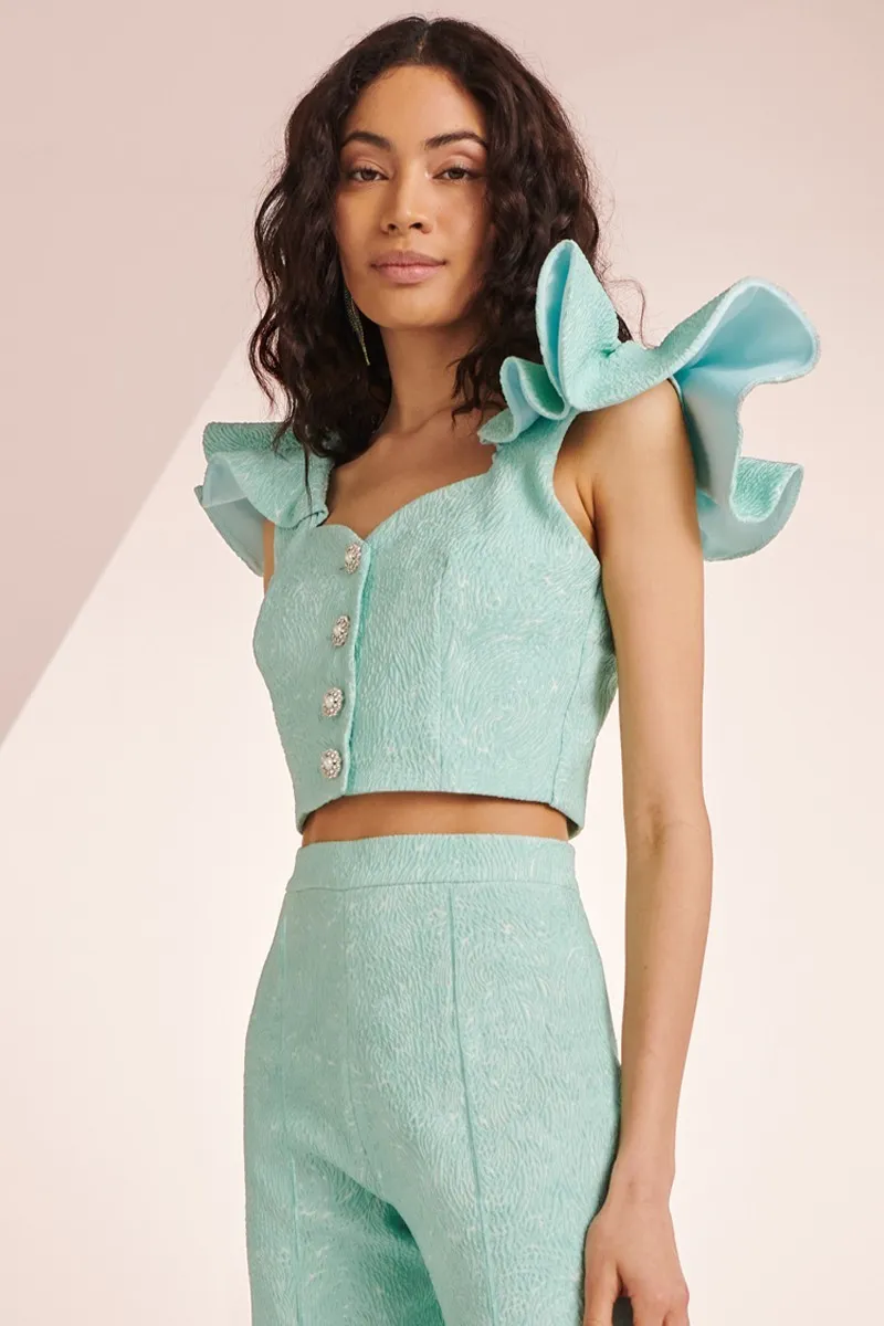 Top con volante en el hombro brocado aguamarina Zooey