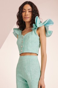 Top con volante en el hombro brocado aguamarina Zooey