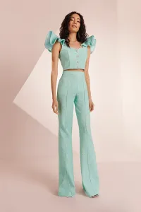 Top con volante en el hombro brocado aguamarina Zooey
