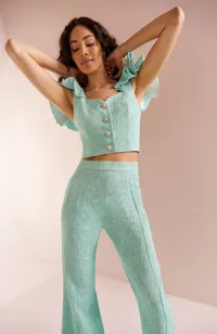 Top con volante en el hombro brocado aguamarina Zooey