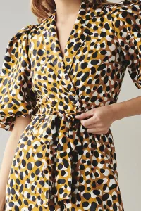 Vestido midi cruzado estampado de lunares mostaza negro y blanco