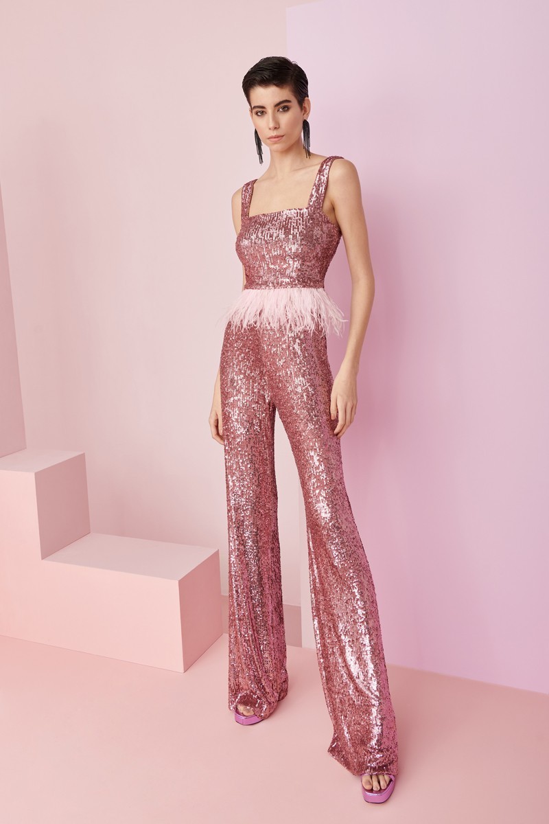 conjunto de fiesta  top corto y plumas y pantalon en lentejuelas