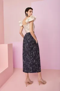 Conjunto de falda con top de volantes en tejido de lino bordado