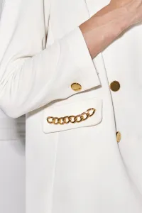 Traje blanco de algodon con cadena dorada