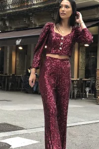 conjunto de top corto con boton joya y manga jamon y pantalon en
