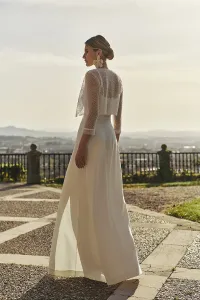 vestido largo de fiesta lencero de crepe blanco con escote en la