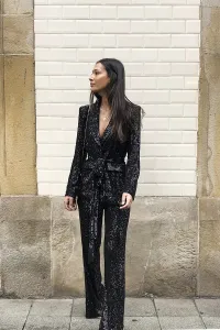 Traje de chaqueta y pantalón negro de lentejuelas