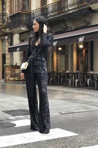 Traje de chaqueta y pantalón negro de lentejuelas