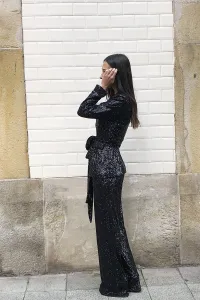 Traje de chaqueta y pantalón negro de lentejuelas