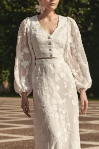 Top en gasa blanca con flores bordadas con manga ablusonada