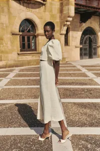 Top manga abullonada joya chanel blanco roto