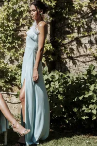 Vestido largo para boda asimetrico en verde agua con volante
