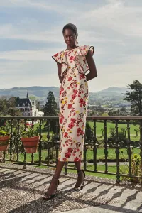vestido con volantes y falda midi de lino bordado flores para