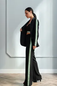 traje chaqueta pantalon negro
