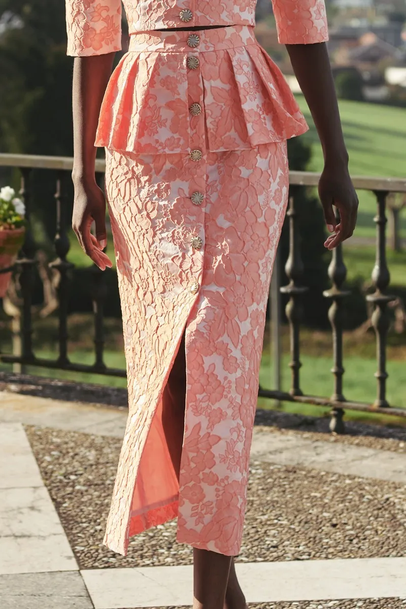 Falda brocada flores coral con peplum y botones joya