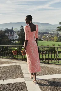 Falda brocada flores coral con peplum y botones joya