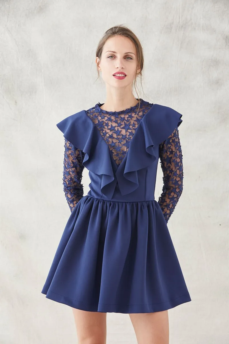 vestido corto de vuelo de neopreno en color azul con estrellas