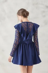 vestido corto de vuelo de neopreno en color azul con estrellas