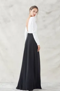 vestido largo blanco y negro de manga larga con bordado pez