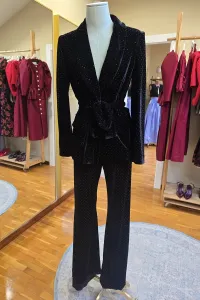 traje de chaqueta y pantalón terciopelo negro