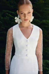 Blusa plumetti blanco escote en pico Mestas